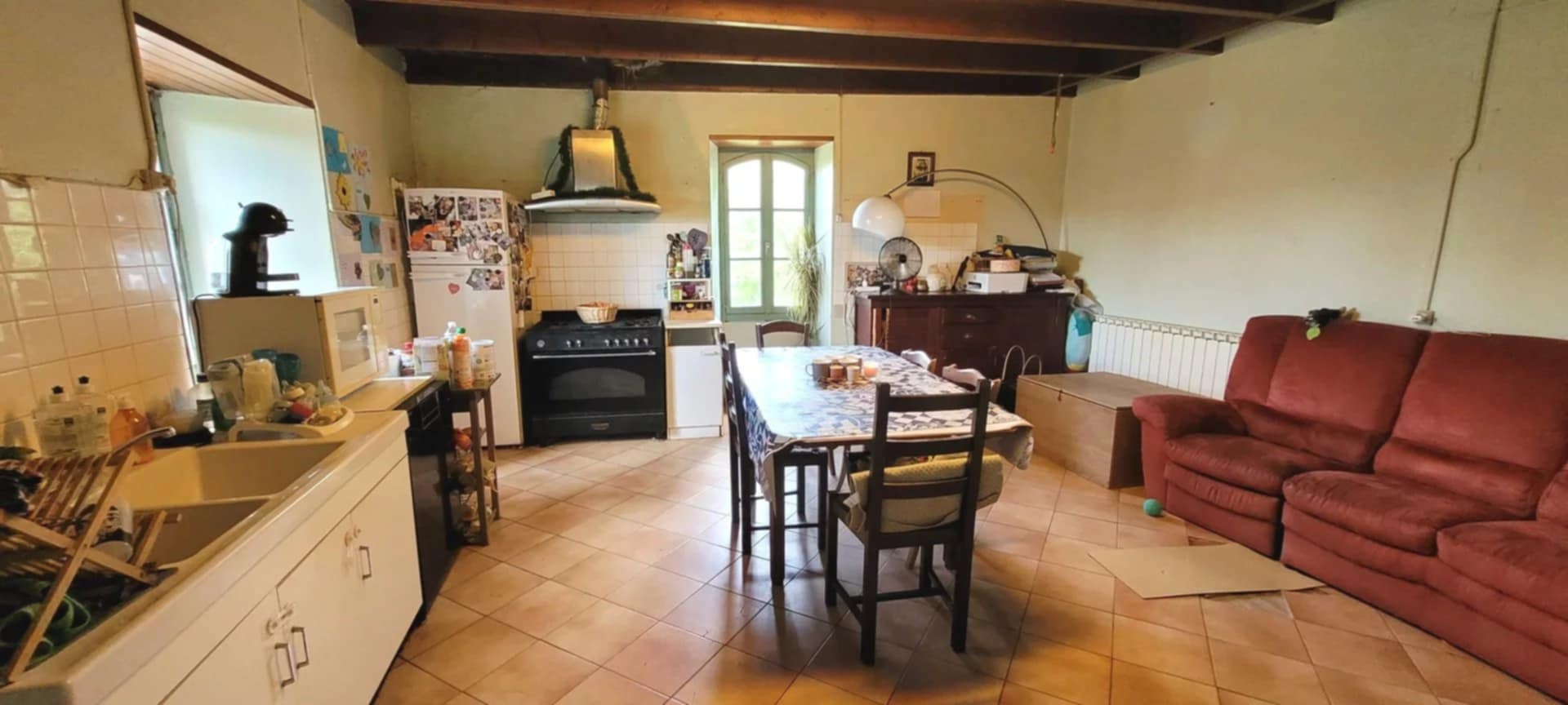 Ancien corps de ferme en situation dominante en sortie d'un hameau